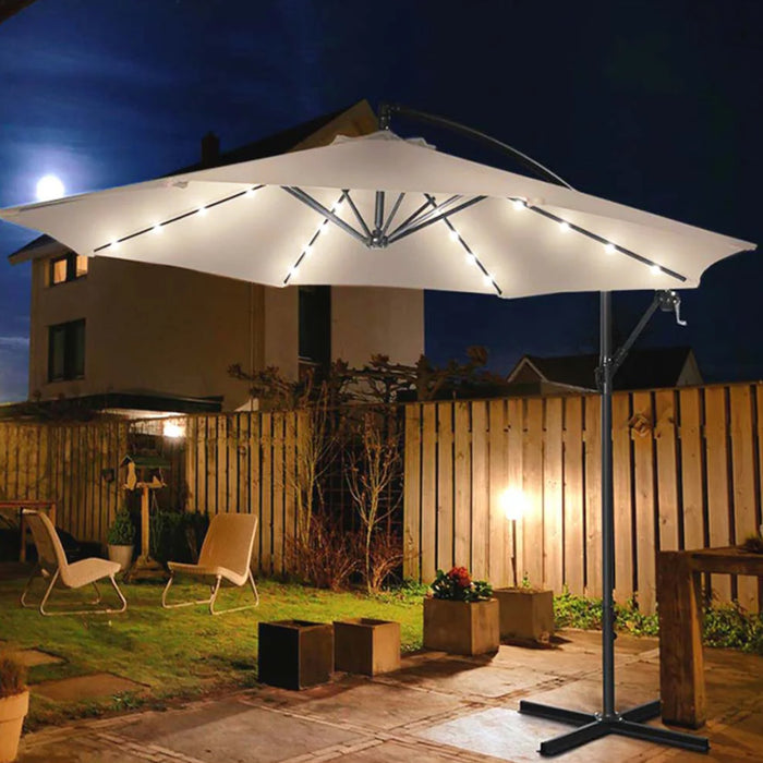 immagine-3-dreamwell-ombrellone-giardino-3-mt-con-luce-led-solare-palo-decentrato-con-carrucola-ecru-32-led-con-pannello-solare-ean-8054143006285