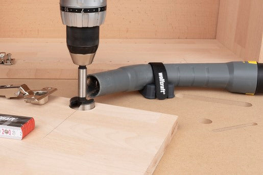 immagine-3-wolfcraft-supporto-per-tubo-dellaspirapolvere-su-tutti-i-tavoli-con-fori-da-20-mm-689100-ean-4006885689107
