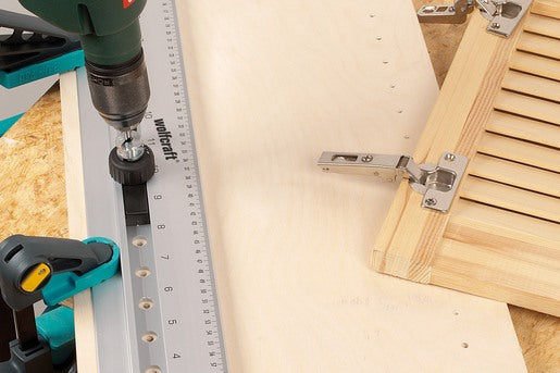 immagine-5-wolfcraft-guida-dima-di-foratura-multifunzione-per-spinature-e-file-di-fori-per-armadi-4650000-wolfcraft-ean-4006885465008